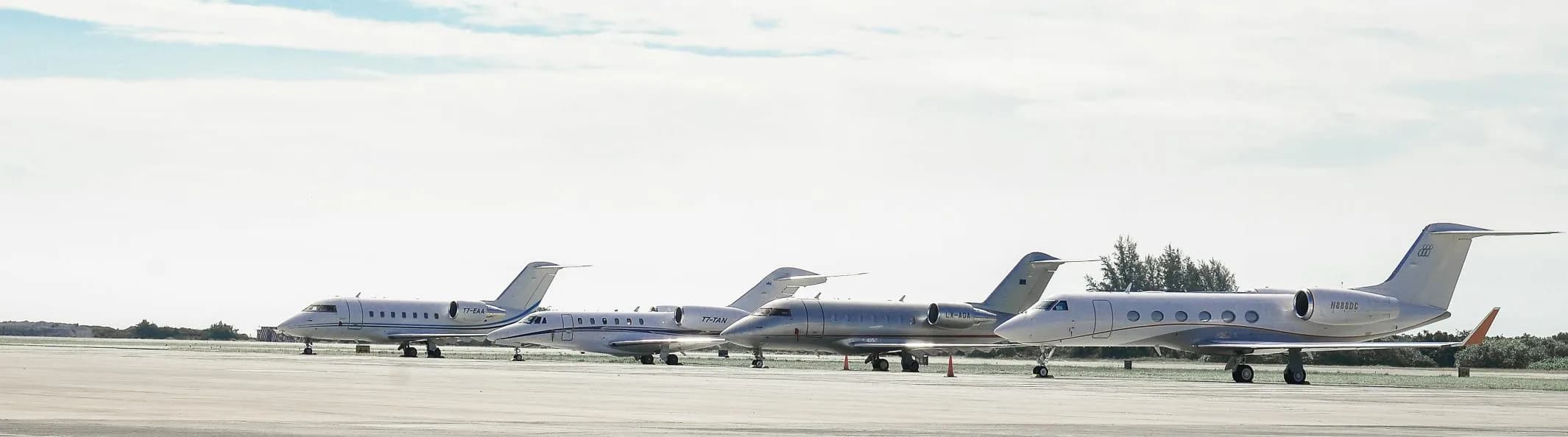 Private jet departing — business aviation terminal